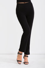 Fitted, mid-rise, full length pant with centre back seams, ankle slits, partial elastic waistband for comfort. Made in a woven Stretch Crepe fabric.