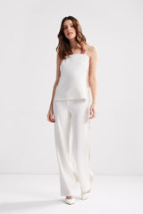 wide-leg woven stretch pant with bold silk panelling along each leg. Custom made in one hundred percent silk.